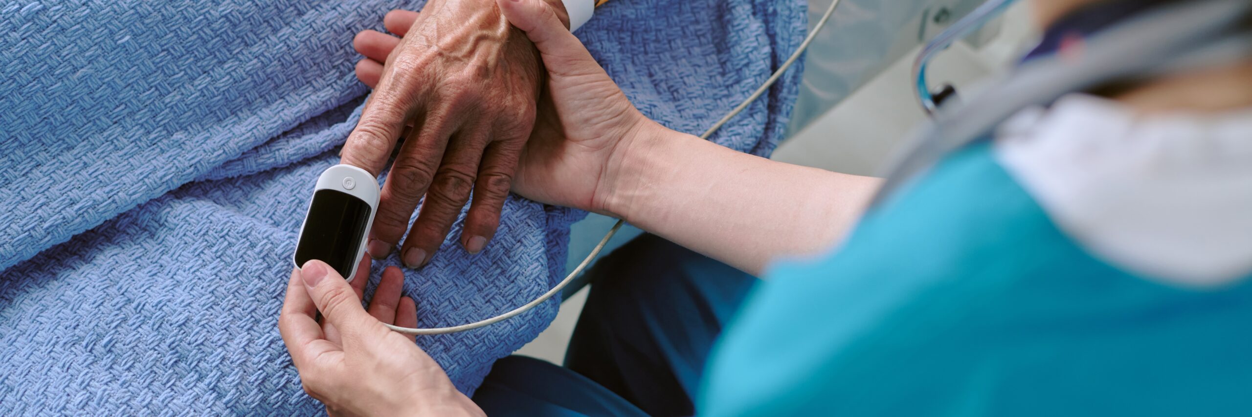 Senior,Person,Lying,In,Hospital,Bed,Having,Pulse,Oximeter,Placed